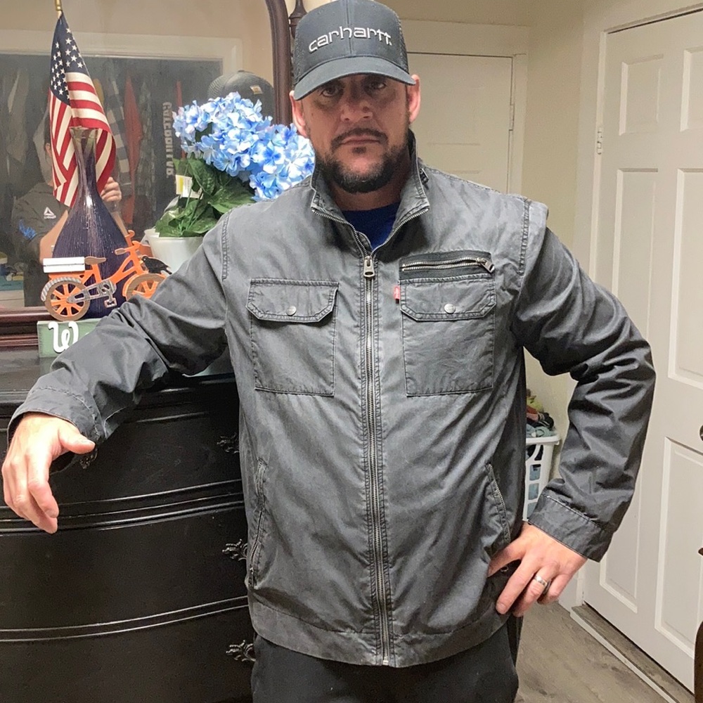 Zip up Levi jacket with two Carhartt hats
